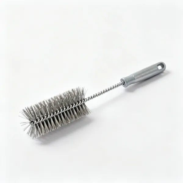 A wire brush with steel bristles and a handle
