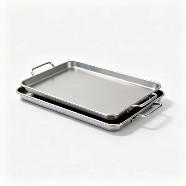 A pair of flat metal baking trays
