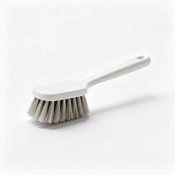 Bowl brush: A washing up brush with stiff bristles
