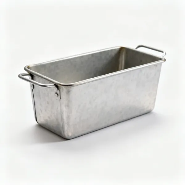 A rectangular metal loaf tin