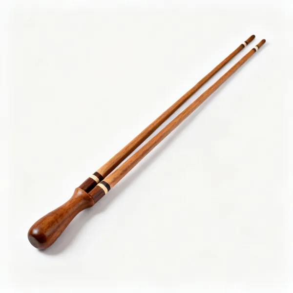 A pair of matched hardwood winding sticks, long thin bars with contrasting inlays