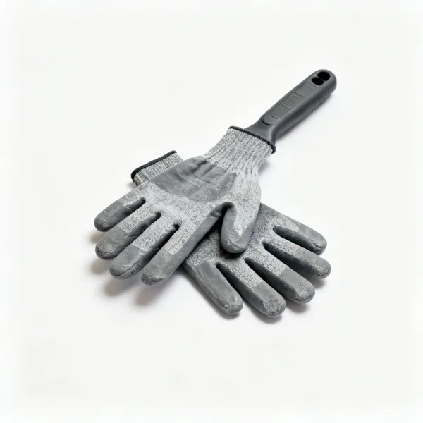 Cut resistant gloves: A pair of grey cut resistant work gloves with coated palms