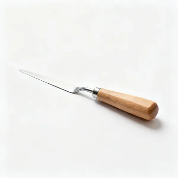A small flexible filling knife with a thin steel blade and a wooden handle