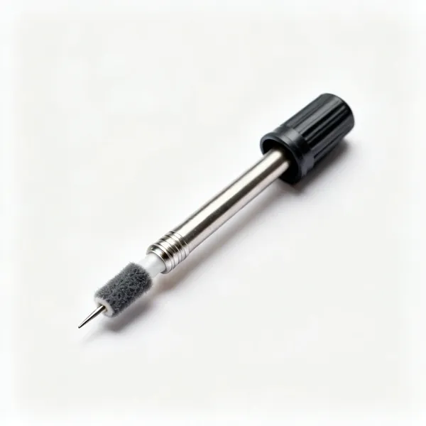 A soldering flux pen with a felt applicator tip and a cap