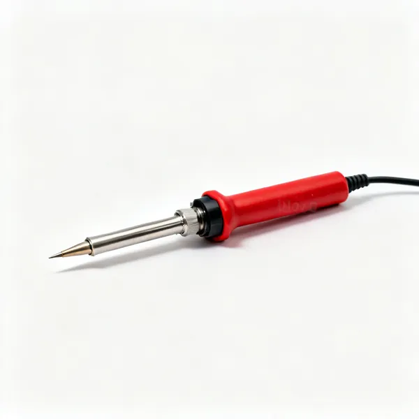 Basic soldering iron: A simple mains soldering iron with a conical tip and a red handle