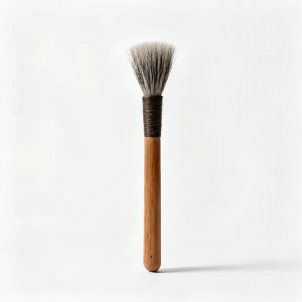 Soil brush: A small soft bristled bonsai cleaning brush with a wooden handle
