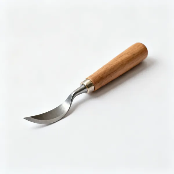 A small bonsai carving gouge with a curved hollow steel blade and a wooden handle