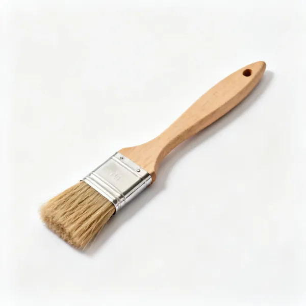 A stiff bristled hand brush with a wooden handle