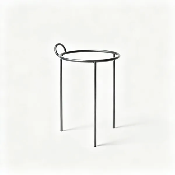 Pot stands: A metal plant pot stand with three legs and a circular ring top