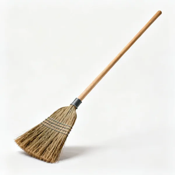 Stiff broom: A stiff bristled yard broom with a long wooden handle