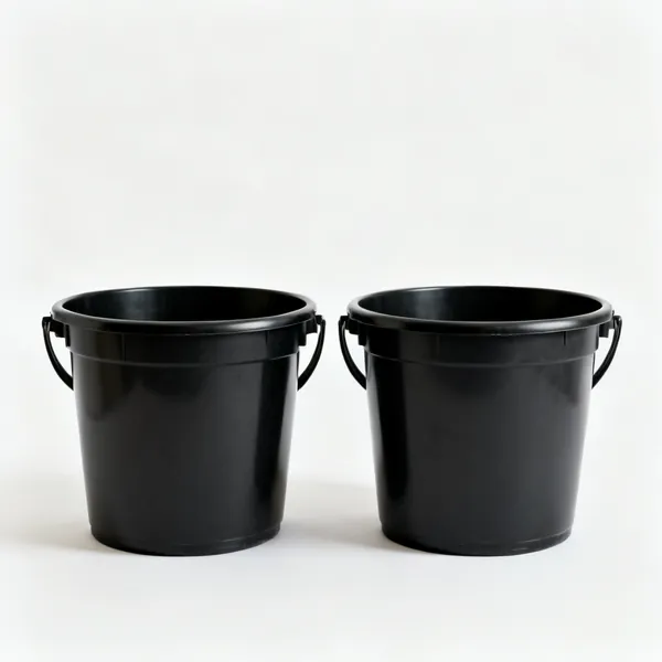 Two black plastic builders buckets side by side