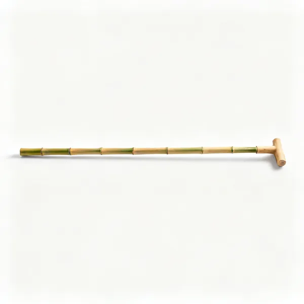 Depth cane: A long straight bamboo garden cane lying flat