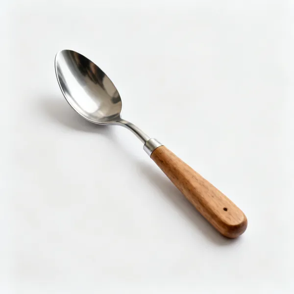 A widger, a narrow curved stainless steel spoon shaped hand tool with a wooden handle