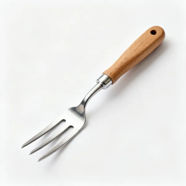 A stainless steel hand fork with three short tines and a wooden handle
