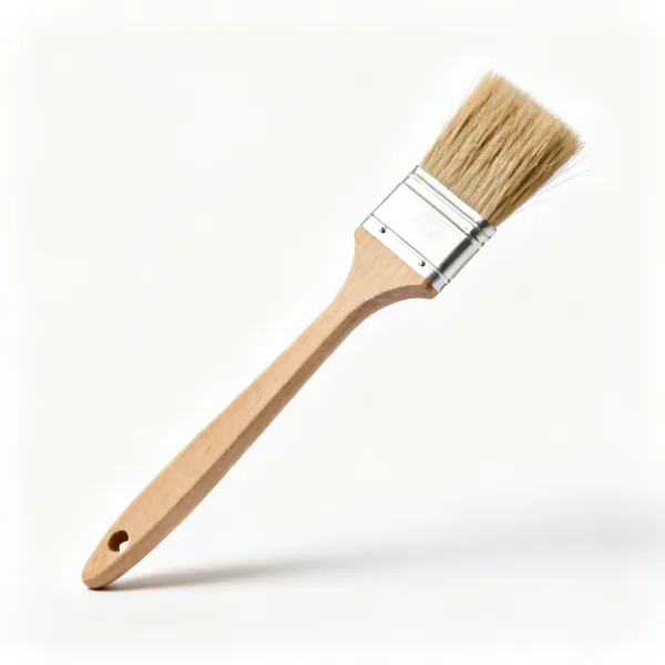 A wide soft bristled jointing brush with a long wooden handle