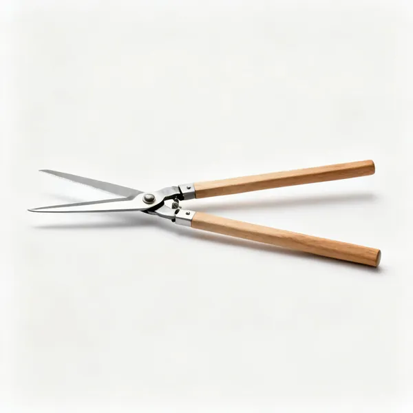 A pair of japanese hedge shears with long thin steel blades and long wooden handles