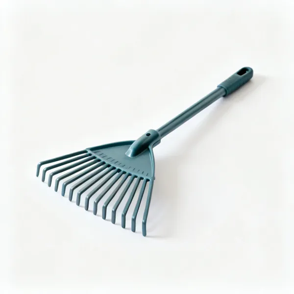 A plastic tined wide leaf rake