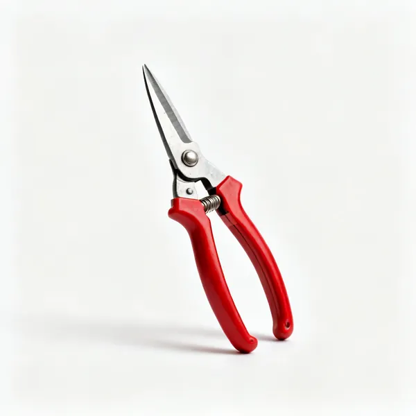 A pair of red handled bypass secateurs