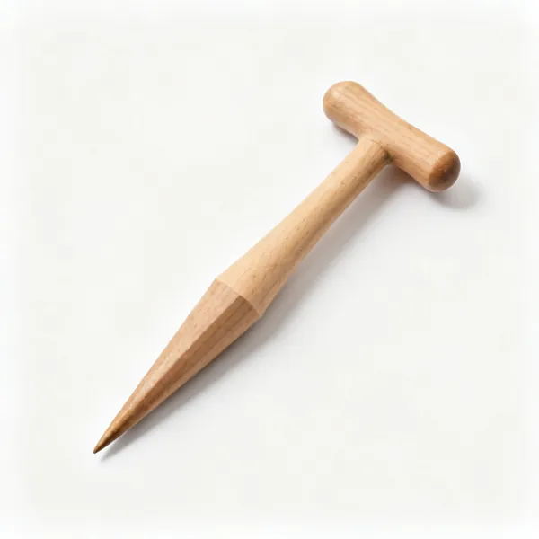 A wooden dibber, a tapered pointed wooden tool with a rounded T handle