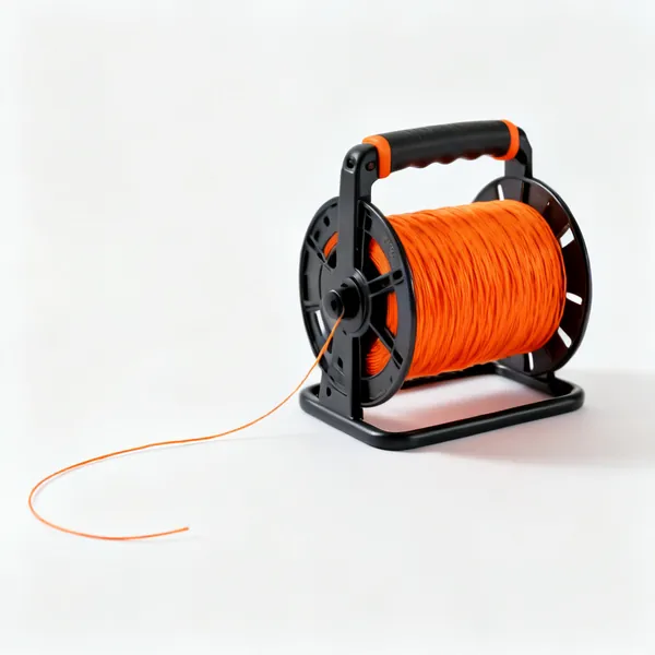 A string line reel with bright orange builders line partly unwound