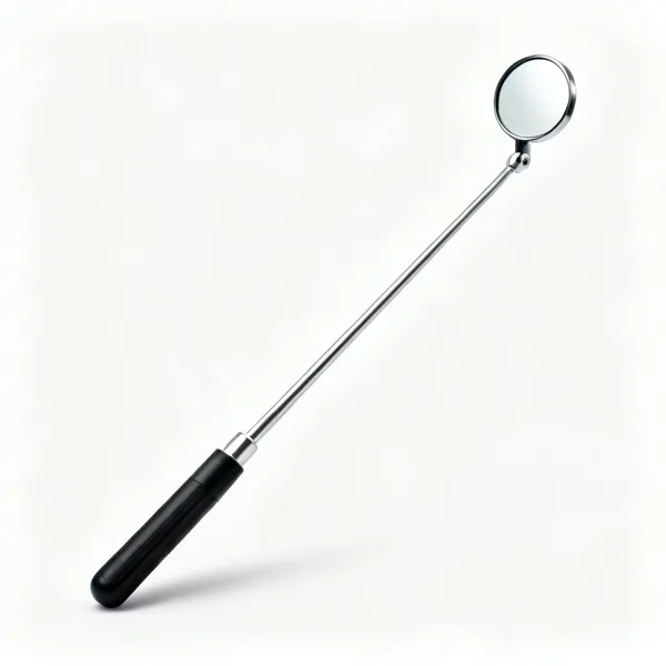 A telescopic inspection mirror with a small round mirror on an extending metal shaft