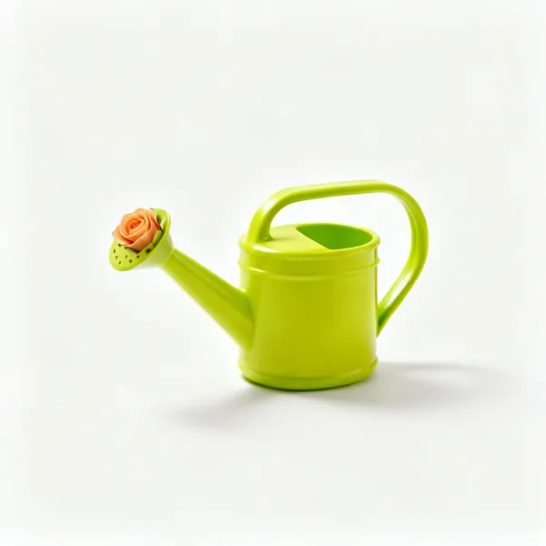Small watering can: A small brightly coloured plastic watering can with a spout and rose