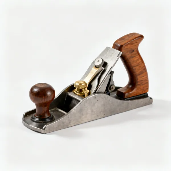 A metal smoothing plane with a cast body, wooden tote handle and brass depth adjuster