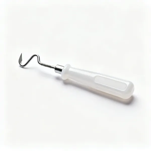 A deburring tool with a plastic handle and a small swivelling hooked steel blade