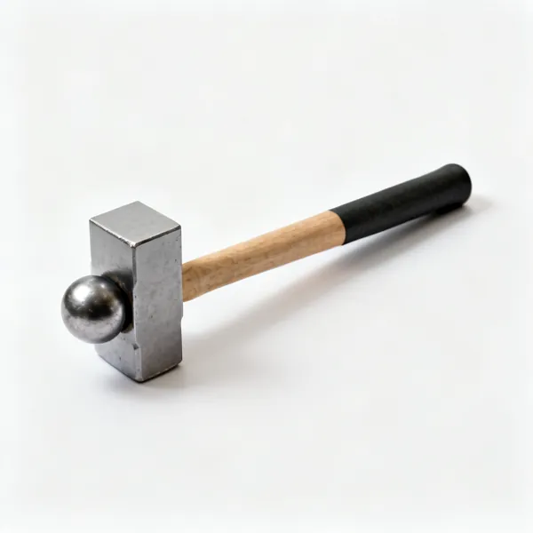 A ball pein hammer with one flat face and one rounded end
