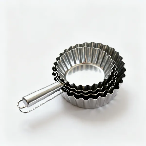 A set of round fluted metal cookie cutters