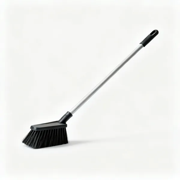 Stiff yard brush: A stiff bristled long handled yard brush