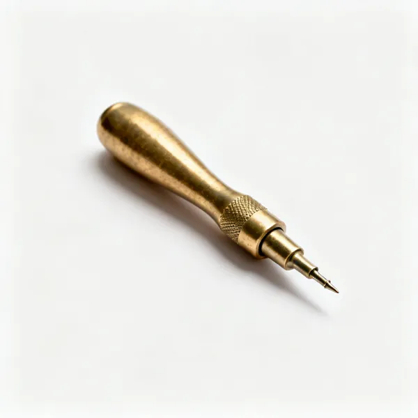 A brass leather pricking iron