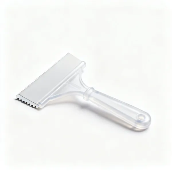 A flat plastic paint tape burnishing tool with a bevelled edge