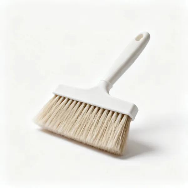 A wide flat wallpaper paste brush with long soft bristles