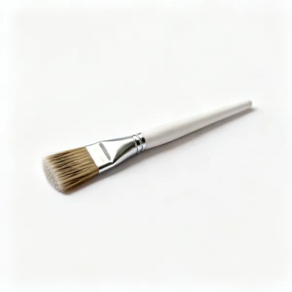 A round stencil brush with short flat cut bristles