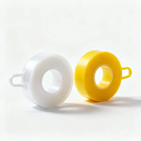 PTFE tape: Two rolls of PTFE plumbers thread seal tape, one white and one yellow