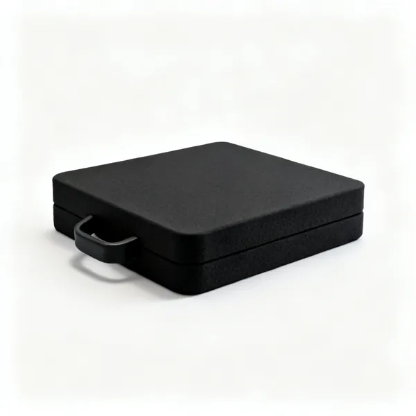 A thick black closed cell foam kneeling pad