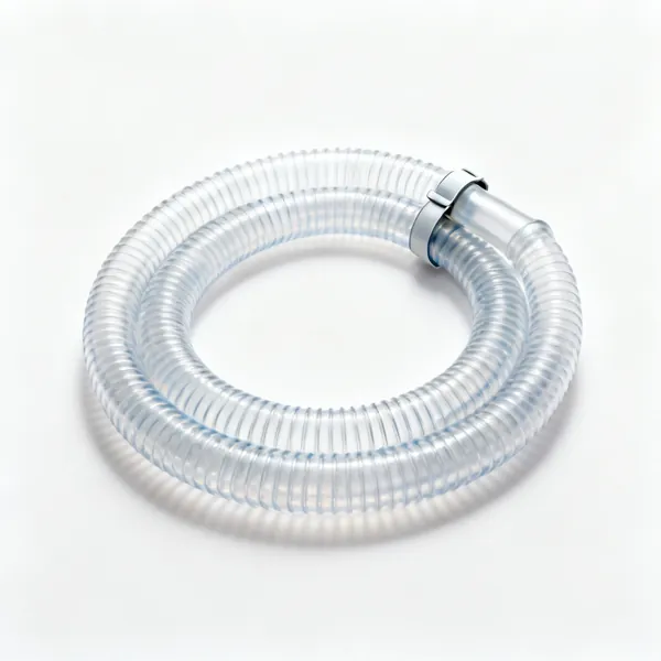 A coiled length of clear plastic drain hose with a hose clip