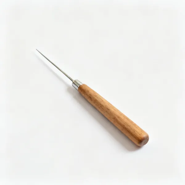 A pottery needle tool with a wooden handle