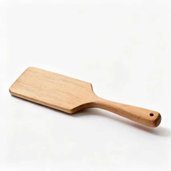 Wooden paddle: A wooden pottery beating paddle