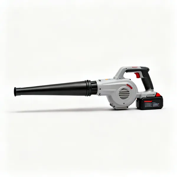 A cordless handheld blower with a nozzle and a battery