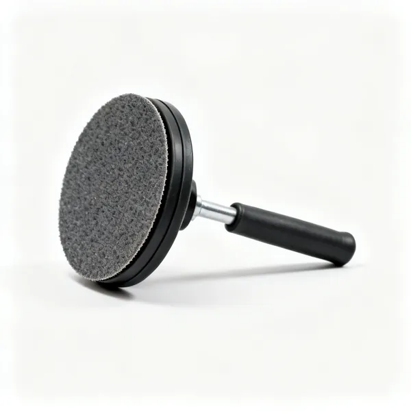 Fibre sanding disc: A fibre backed abrasive sanding disc with a rubber backing pad