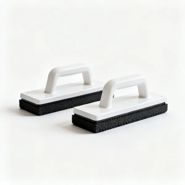 Two rubber soled push blocks with plastic handles