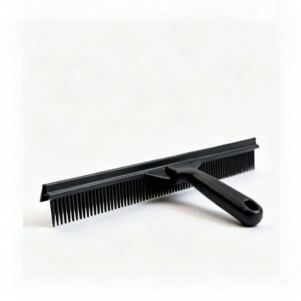 A black plastic eaves comb filler strip with a ridged profile