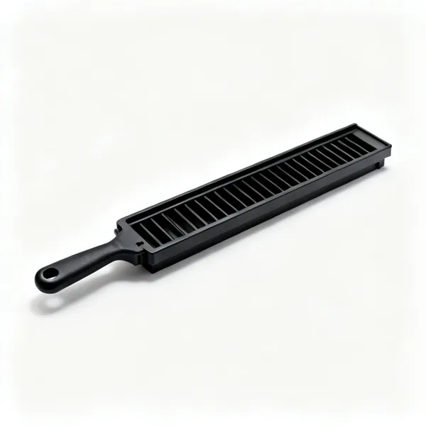 A black plastic over fascia ventilation strip section
