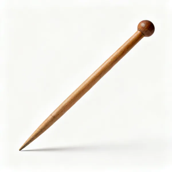 A tapered hardwood lead bending stick with a rounded end
