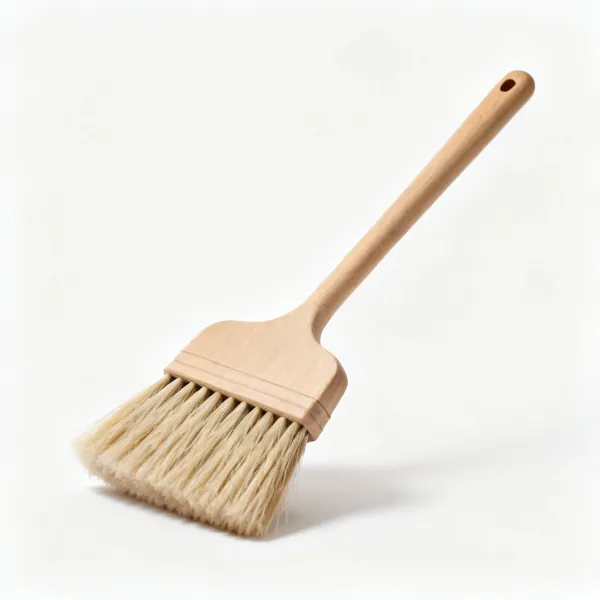 Soft broom: A soft bristled hand broom with a wooden handle
