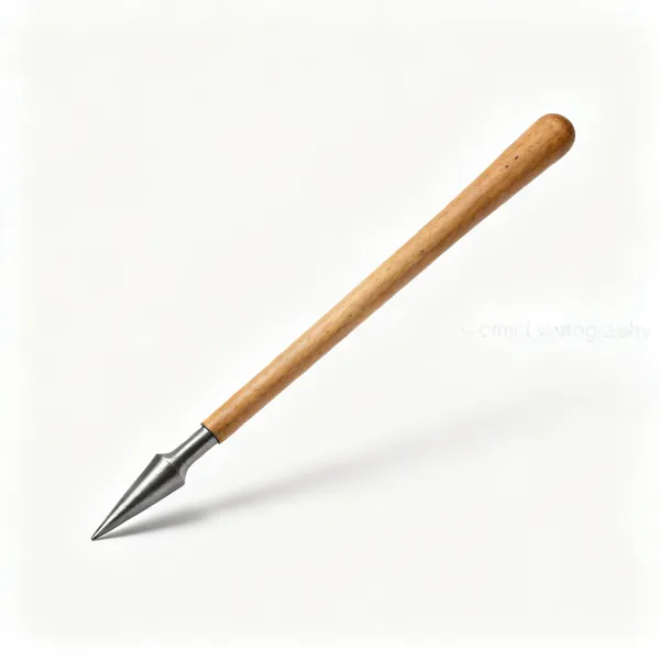 Hardwood dressing stick: A shaped hardwood sheet metal dressing stick with a tapered end