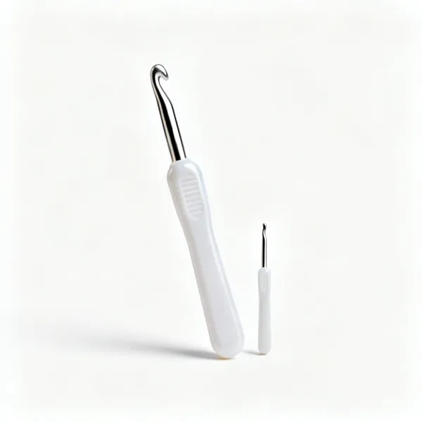 Jumbo hook: A very large jumbo plastic crochet hook beside a normal sized one for scale