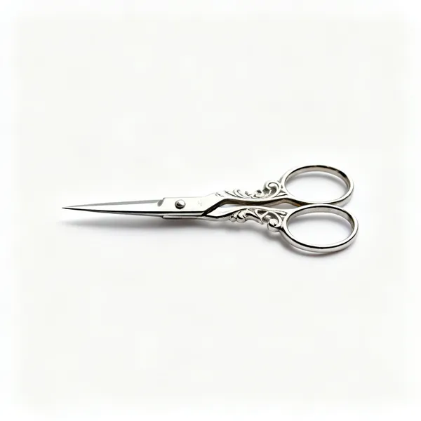 Small scissors: A pair of small sharp embroidery scissors with decorative handles